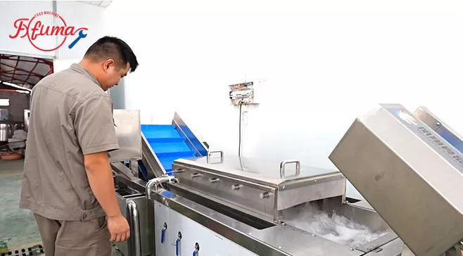 Our engineer is testing our food processing machine